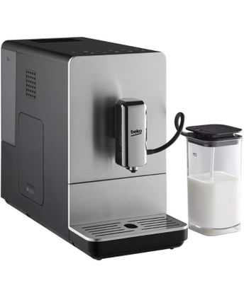 the coffee machine is next to a glass of milk