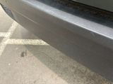 a close up of a car ' s rear bumper
