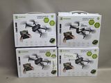 three boxes of remote controlled drones sitting on top of each other