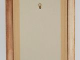 an image of a picture frame with a light bulb on it