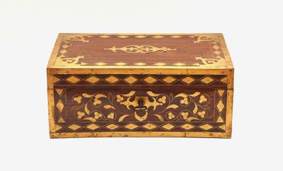 an image of a wooden box with a decorative design on it