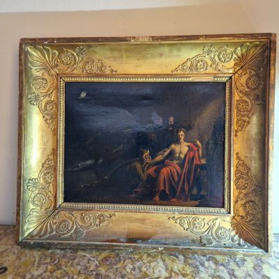 tableau représentant un homme et une femme assis sur un canapé dans une pièce