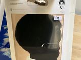 a box with a picture of a woman on it sitting on a table