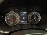 a close up of a car dashboard with various gauges