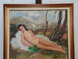 un tableau représentant une femme nue allongée sur un oreiller