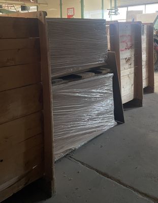 a room with a lot of boxes and boxes on the floor