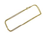 a close up of a gold chain on a white background
