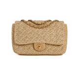 a chanel beige straw bag with gold hardware and chain