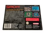 a back cover of a video game box with a picture of a city