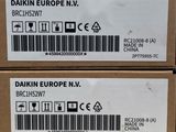 two boxes with labels on them are stacked on top of each other