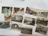 many old photos of people and animals on the fridge