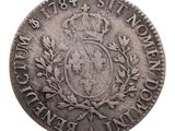 gros plan d'une pièce de monnaie surmontée d'une couronne