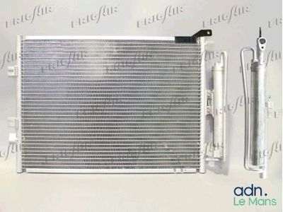 a radiator for a car is shown with the radiator and tools