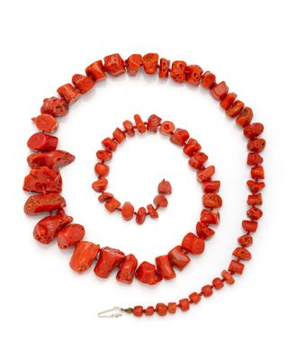 an image of a necklace and bracelet made out of red coral