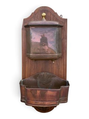 a wooden wall mounted shelf with a picture on it
