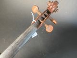 a violin that is sitting on a table