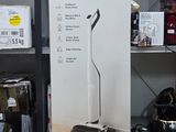 a cardboard box with a black and white vacuum on it