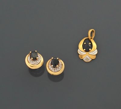 Demi-parure en or jaune et gris 18K 750 millièmes comprenant…