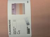a piece of paper that has a picture of a building on it