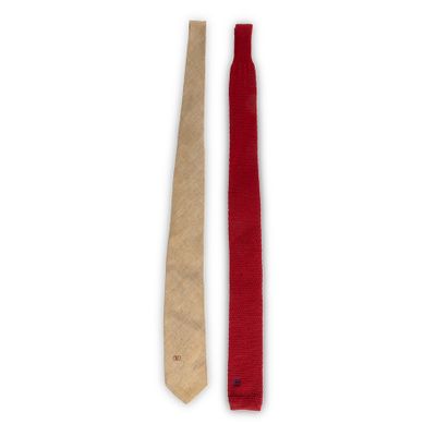 pair of red and beige ties on a white background