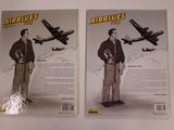 two books on the table that have a picture of a man standing in front of an airplane