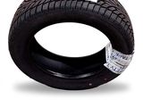 a close up of a tire on a white background