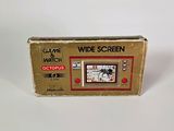 a box with a game and watch on it on a white surface