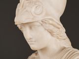 a statue of a woman with a helmet on her head