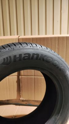a tire that is sitting on top of a cardboard box