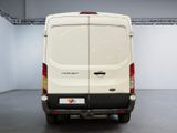 a white van that is parked in a room