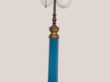 a blue lamp that is on top of a table