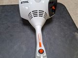 an image of a blow dryer sitting on a chair