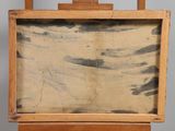 an old wooden easel with a painting on top of it