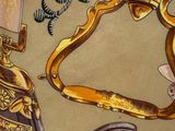a picture of a gold and black wallpaper with a picture of a man on horseback