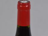 a bottle of wine that is sitting on a table