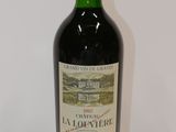 a bottle of wine that is sitting on a table