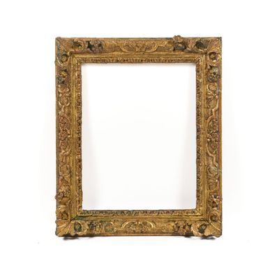 a gold frame with a decorative pattern on it