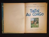 an open book with a picture of a dog and a cat on it