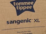 a box of toilet paper sitting on the floor