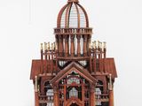a wooden clock that is on display in a room