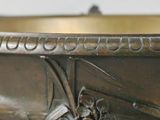 a close up of a metal bowl on a table