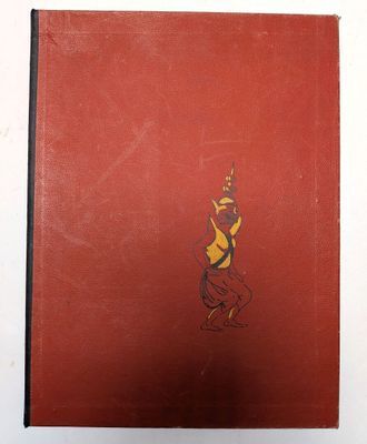 un vieux livre sur lequel figure le dessin d'une femme
