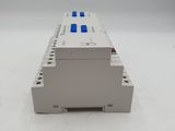 a close up of an electronic device on a white surface