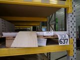 a lot of boxes of wood on a shelf in a warehouse