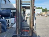 a forklift that is parked in a parking lot