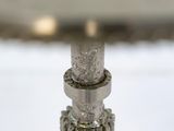 a close up of a metal object on a table