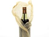 a bottle of wine wrapped in a plastic wrap