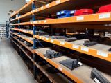 many shelves with various tools on them in a warehouse