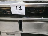 a number 14 on the top of a stove