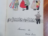 an open book with a drawing of a group of people on it